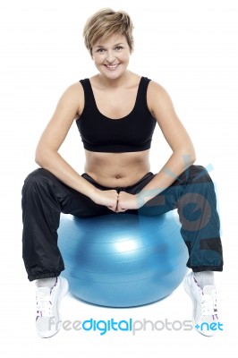 Fitness Woman Relaxing On Exercise Ball Stock Photo