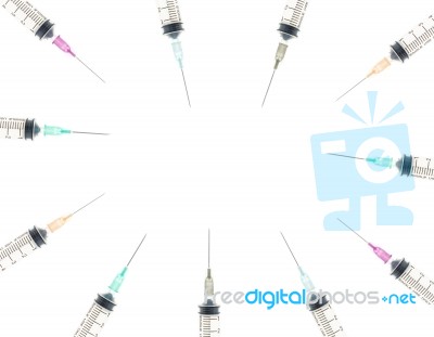 Five Color Syringe Background On Circle View Stock Photo