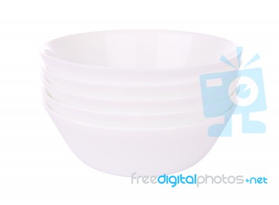 Five Round Ceramic Bowls Stack On White Background Stock Photo