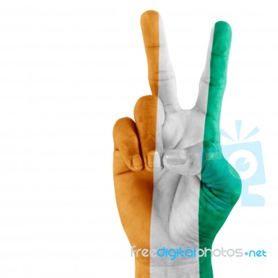 Flag Of Ivory Coast  On Victory Hand Stock Photo