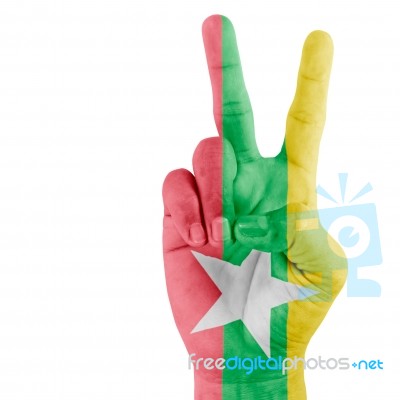 Flag Of Myanma In Victory Hand Stock Photo