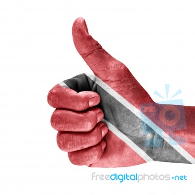 Flag Of Trinidad And Tobago On Thumb Up Hand Stock Photo