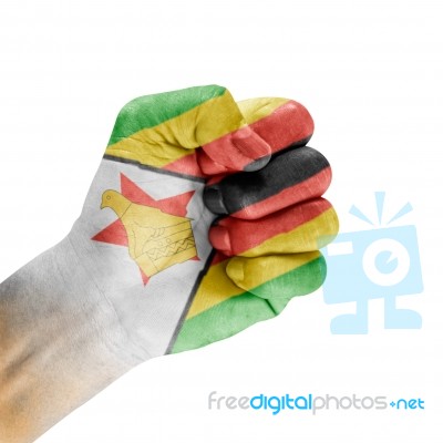 Flag Of Zimbabwe On Hand Stock Photo