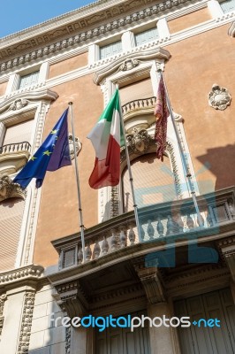 Flags Flying On A Building In Venice Stock Photo