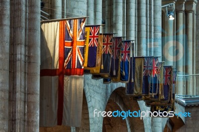 Flags Hanging In Ely Cathedral Stock Photo