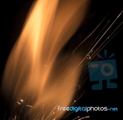 Flame Dancing On Black Stock Photo