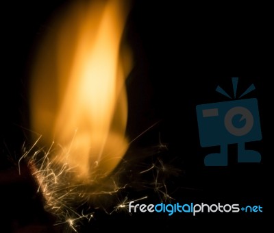 Flame Dancing On Black Stock Photo