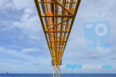 Flare Bridge From Gas Production Platform In Offshore Stock Photo