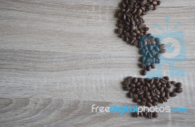 Flat Lay Of  Coffee Beans In Form Of Coffee Cup And Smell Smoke Stock Photo