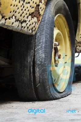 Flat Tire Of Old Car Stock Photo