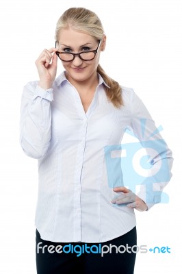 Flirtatious Corporate Woman Staring You Stock Photo