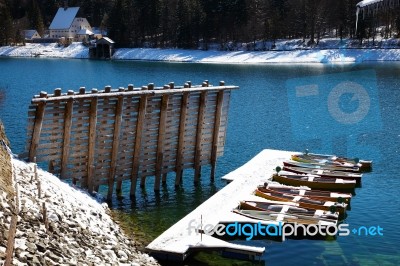 Floating Boats Covered In Snow At Walchensee Lake In Bavaria Ger… Stock Photo