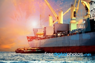 Floating Container Ship Loading Rice And Food Product Into Storage Use For Import Export And Vessel Industry Stock Photo