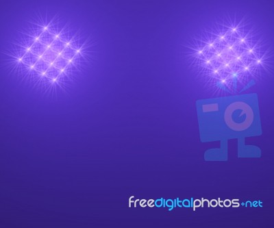 Floodlights In Night Sky Stock Image