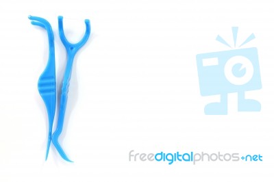 Floss Toothpick On White Background Stock Photo