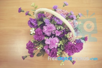 Flower Basket On Wood Top View Stock Photo