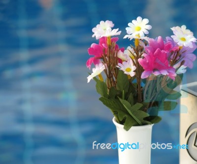 Flower Bouquet At The Pool Stock Photo