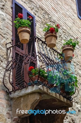 Flowers On A Balcony In Pienza Tuscany Stock Photo