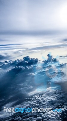 Flying Above The Clouds Stock Photo