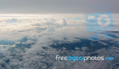 Flying Above The Clouds. View From The Airplane, Soft Focus Stock Photo