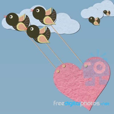 Flying Birds Pulling Heart On Sky Stock Image