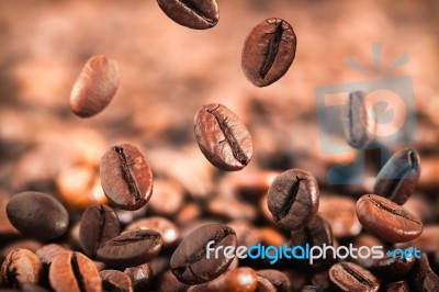 Flying Coffee Beans Stock Photo