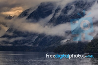 Foggy Mountain Scene In Milfordsound Fiordland National Park Soutn Island New Zealand Important Traveling Desination Stock Photo