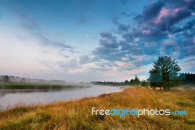 Foggy River In The Morning. Summer Foggy Sunrise. Misty Morning Stock Photo