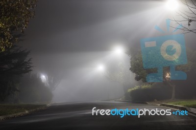 Foggy Street At Night Stock Photo