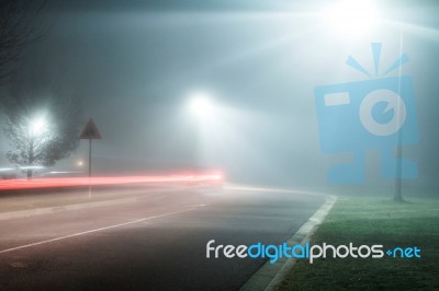 Foggy Street At Night Stock Photo