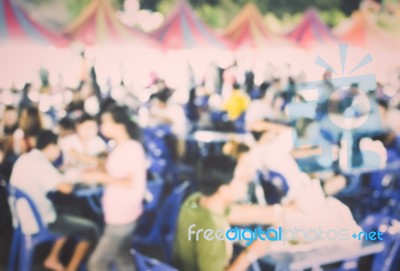 Food Festival With Blurred People Background Stock Photo