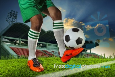 Foot Ball Player Holding Foot Ball On Leg Ankle On Soccer Sport Stock Photo