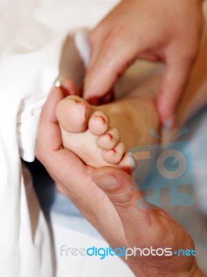 Foot Massage In The Spa Salon Stock Photo