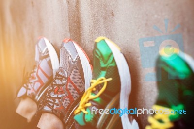 Foot Wear On Walls Stock Photo