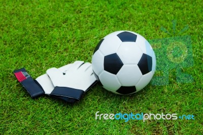 Football And Gloves Stock Photo