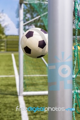 Football Between Goalposts Stock Photo