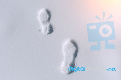 Footprints In Snow Stock Photo