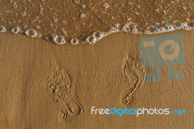 Footprints On Sand Stock Photo