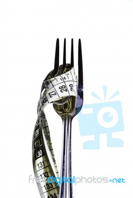 Fork With Measuring Tape Stock Photo