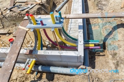 Foundation With Pipes On Building Site Stock Photo