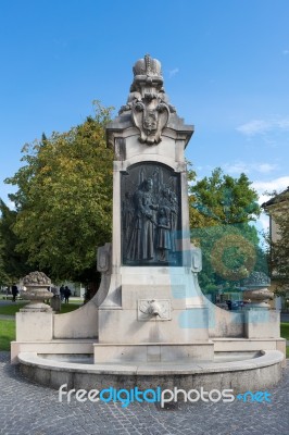 Fountain Beside The Collegiate Church Of St Michael In Mondsee Stock Photo