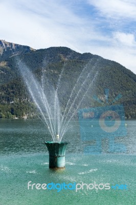 Fountain In Lake Wolfgang At St. Gilgen Stock Photo