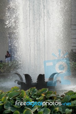 Fountain Next To The Brandenburg Gate In Berlin Stock Photo