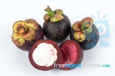 Four Mangosteens Stock Photo