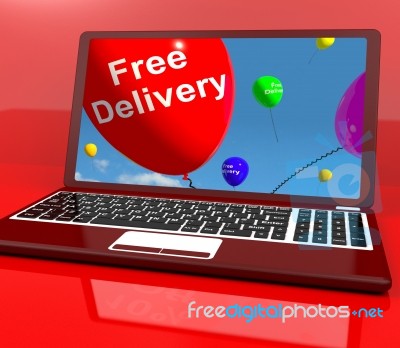 Free Delivery Balloons On Computer Showing No Charge Or Gratis T… Stock Image