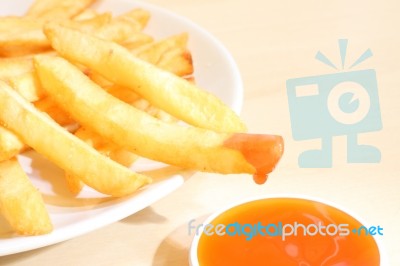 French Fried Dipped Sauce On Light Table Stock Photo