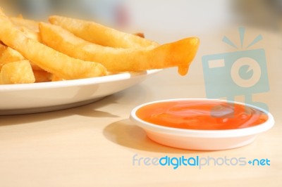 French Fried Dipped Sauce On Light Table Stock Photo