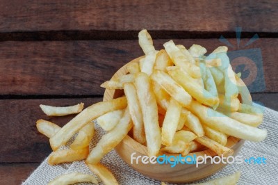 French Fries On Tablecloth Stock Photo