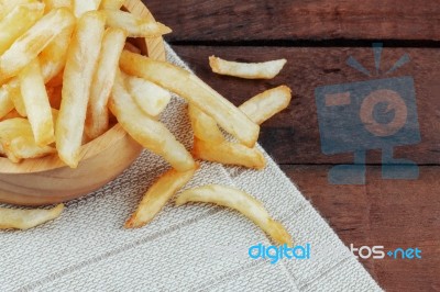 French Fries On Tablecloth Stock Photo