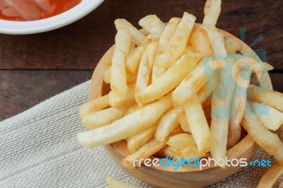 French Fries On Wooden Stock Photo